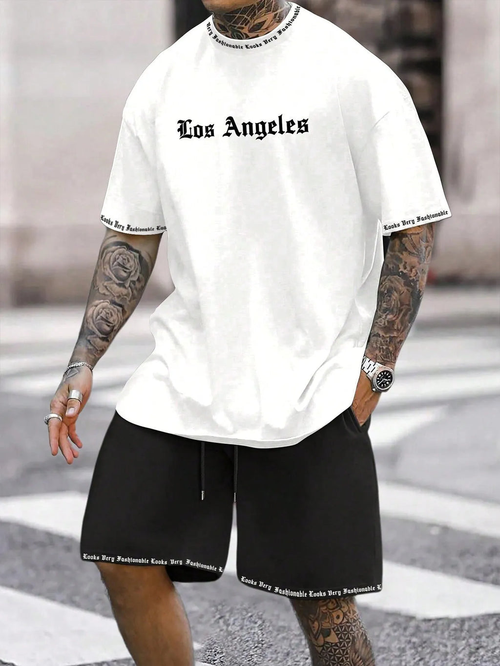 Sports style short-sleeved shirt and matching shorts set in a thin, printed fabric on a mannequin.