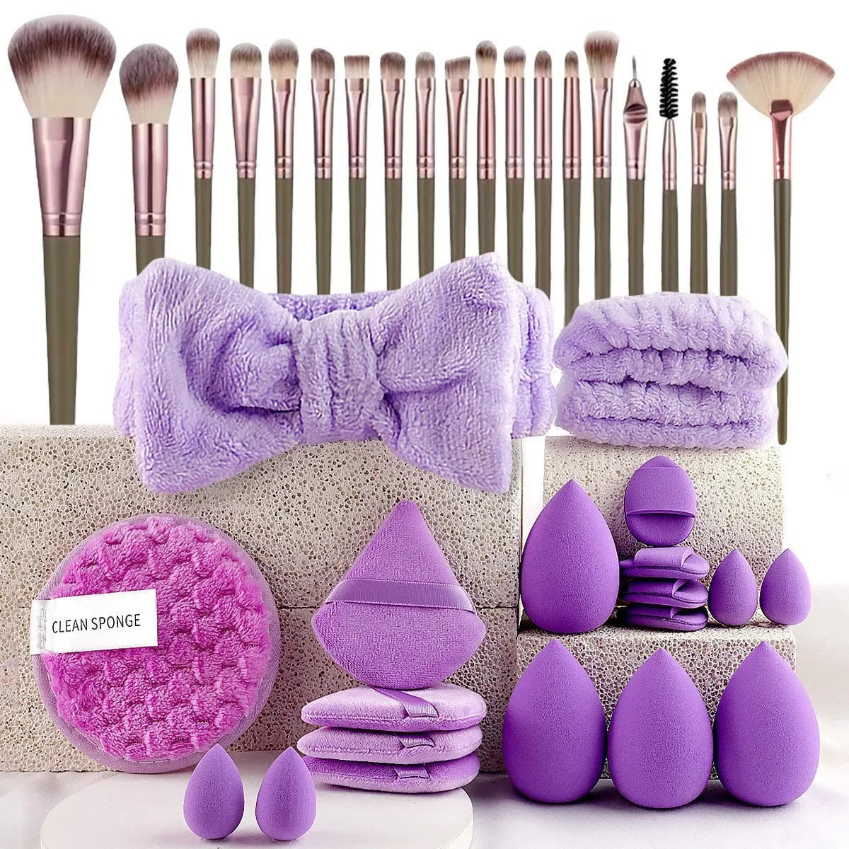 40-piece makeup sponge set in coffee brown, pink, and purple on white background