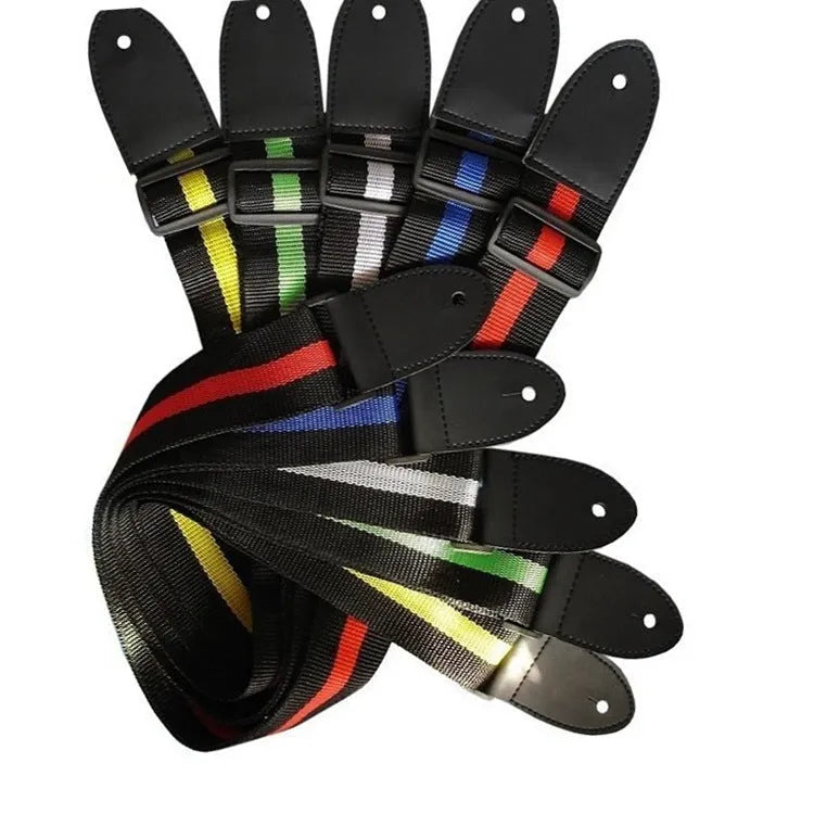 Woven striped crossbody guitar strap shown in multiple colours including army green, dark blue, red, white, and yellow.