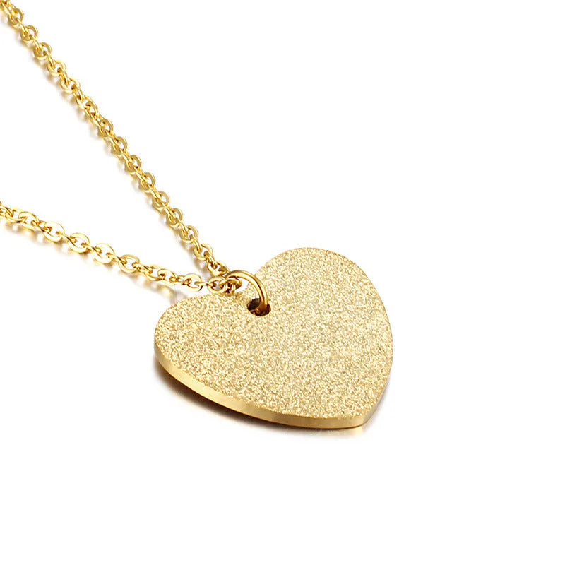 Geometric heart-shaped titanium steel pendant necklace on model