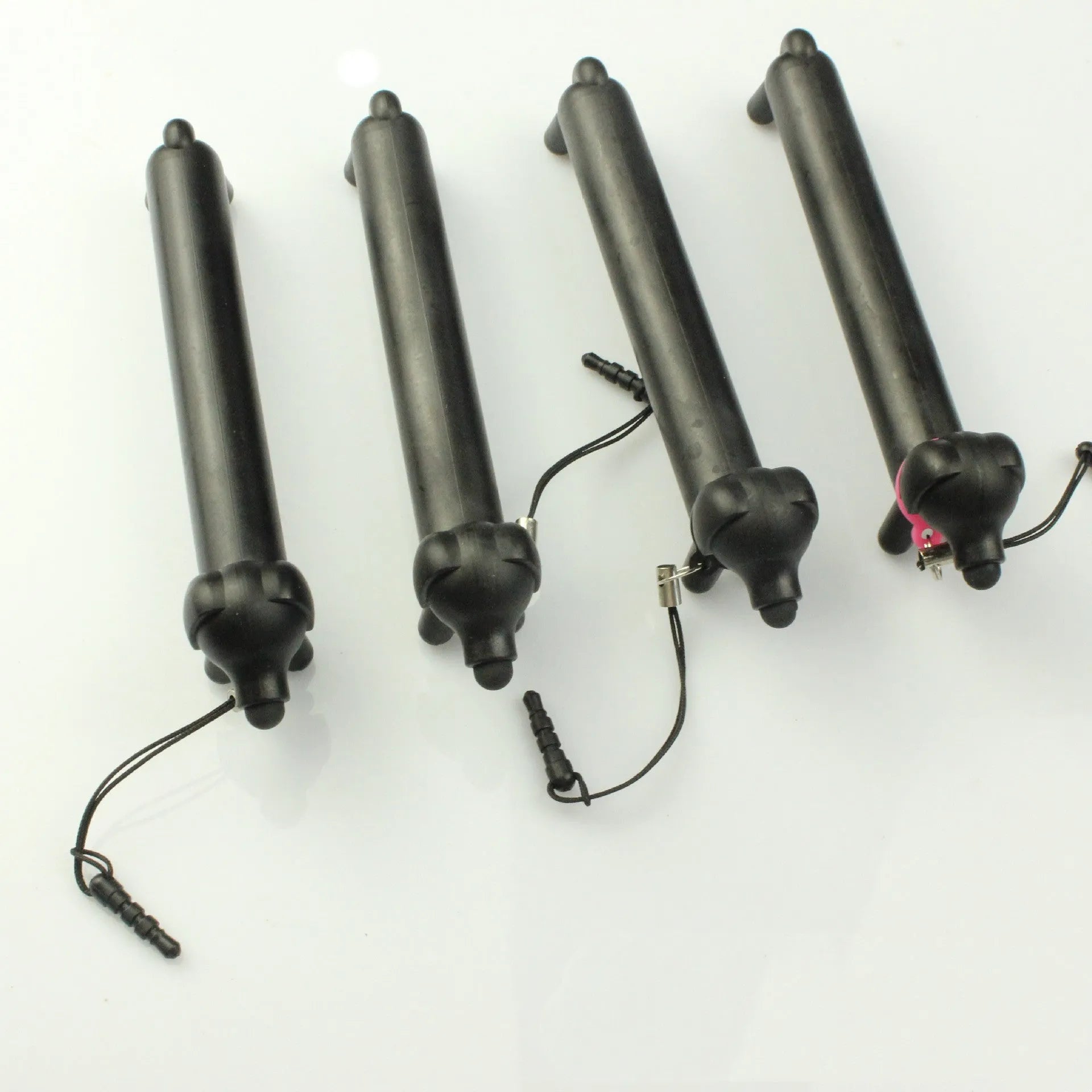 Black dog-shaped touch screen stylus with conductive body and phone holder function