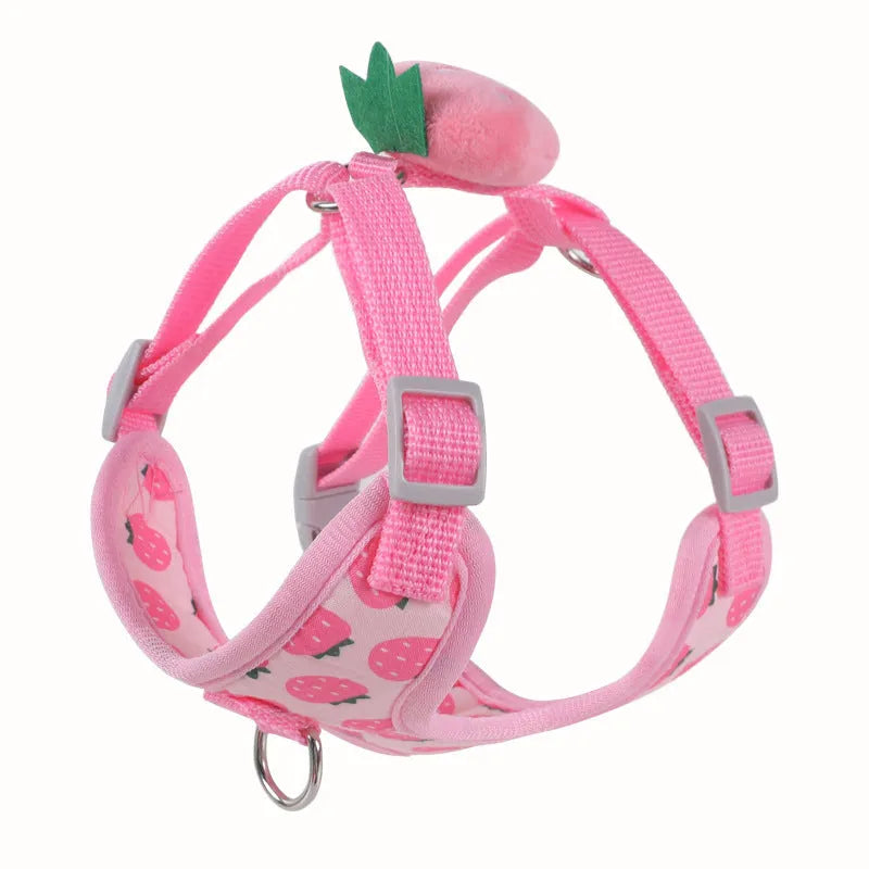 Reflective vest-style harness for small dogs with attached leash in avocado, carrot, and strawberry colours