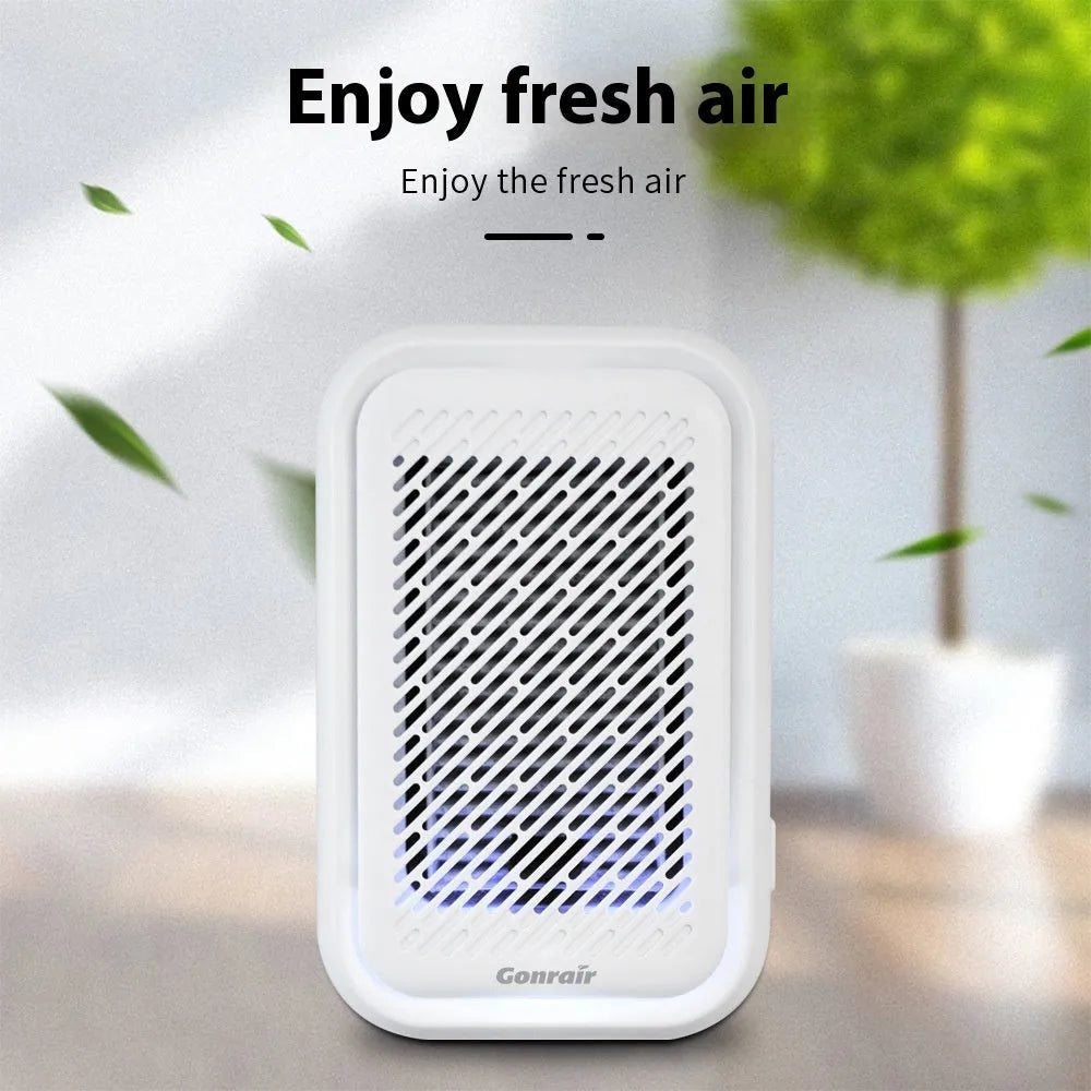 White wall-mounted air purifier with direct plug-in cord and filter screen