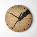 Modern round wooden wall clock with a cracked finish, 30cm in diameter.