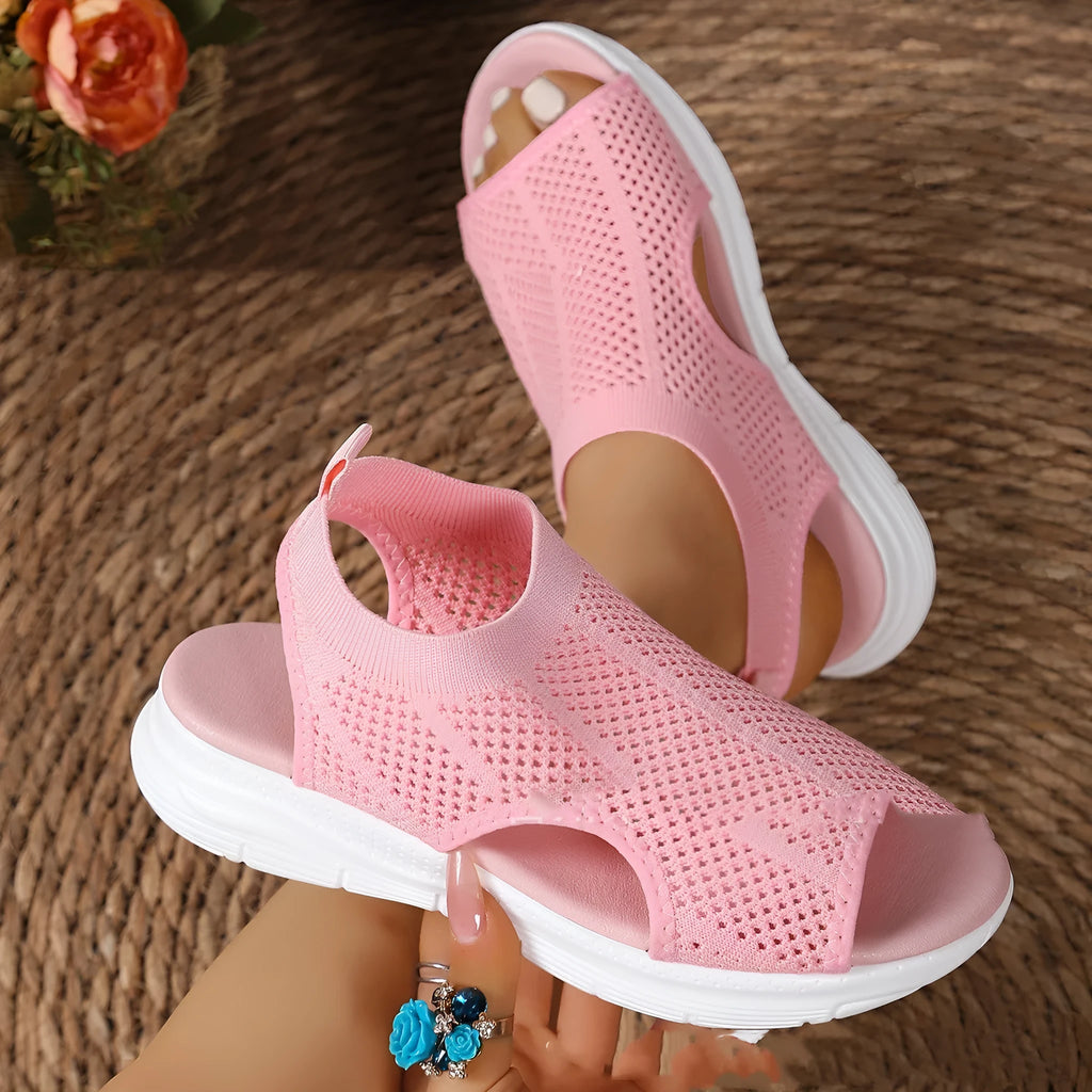 Women's black platform sports sandals with mesh lining and a flat toe bracket on a rubber sole.