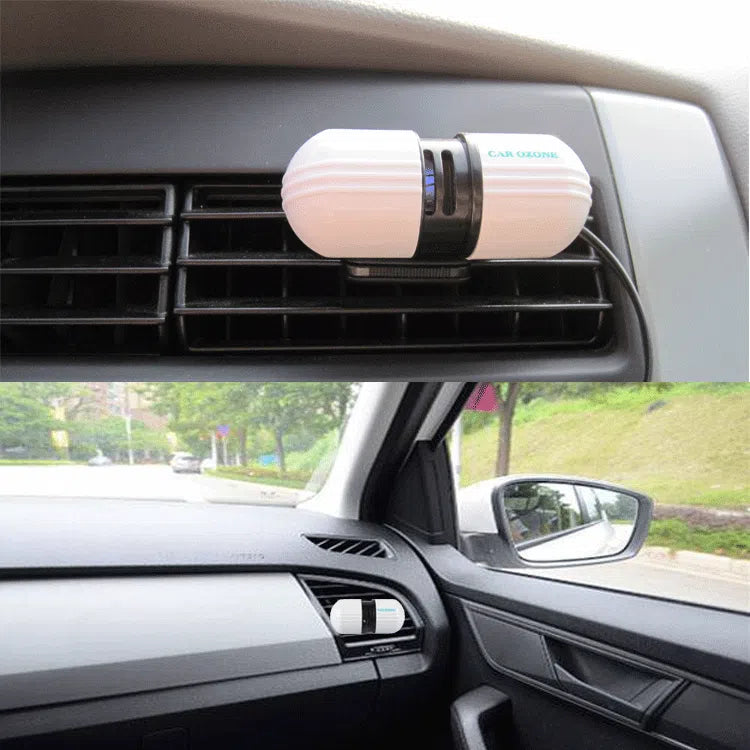 White car air purifier deodorizer 75x30x26mm with 12V plug on a surface