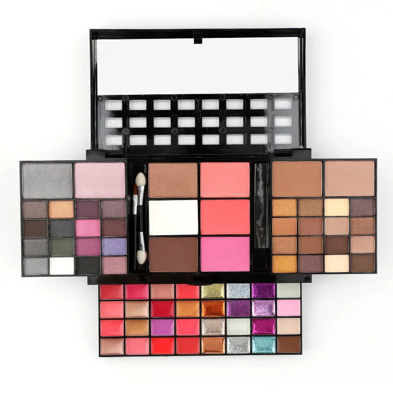 74 colour makeup palette set open showing four layers of eyeshadows, lip glosses, blushes, and contour powders with brushes