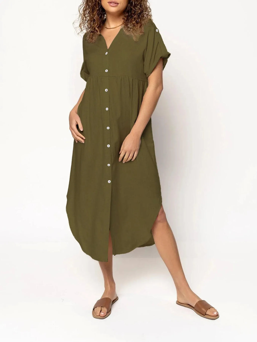 Casual solid colour mid-length dress with button front closure on a hanger.