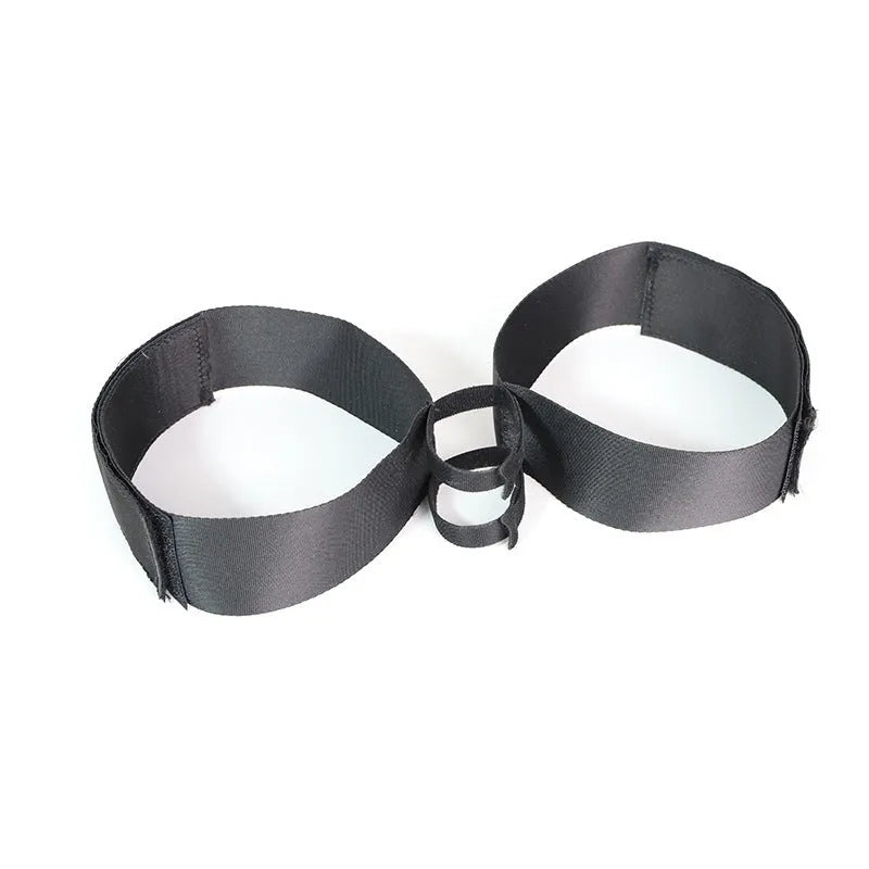 Black adjustable sex toy strap with knitted belt construction for secure adult toy attachment