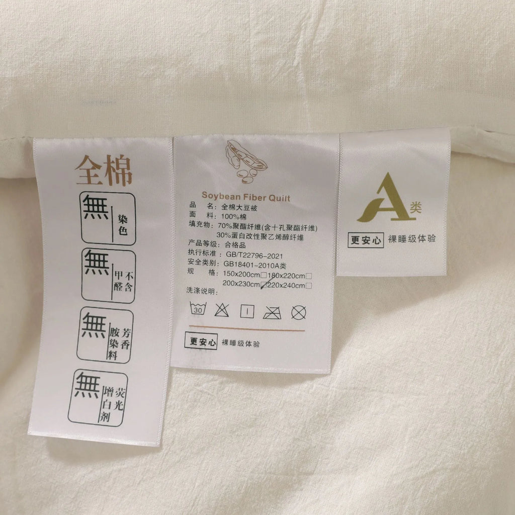 Soybean fibre quilt with pure cotton cover in white, pink jade, or grey, shown in various sizes.