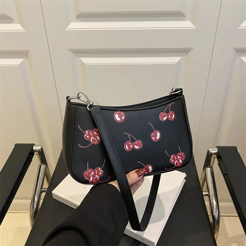 Casual PU underarm crossbody bag with floral print in black colour showing three-dimensional outer pocket