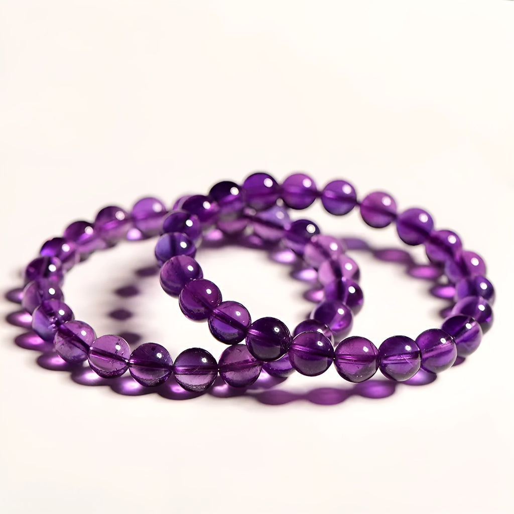 Natural amethyst Uruguay bracelet with scattered polished beads on a single ring.