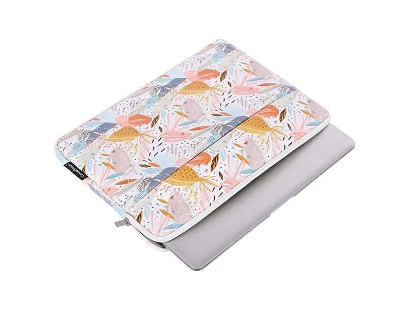 White PU leather waterproof laptop inner sleeve for 14 inch computers on a table.