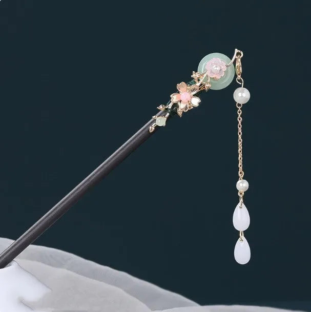 Chinese ancient style floral alloy hairpin with electroplated finish on dark background
