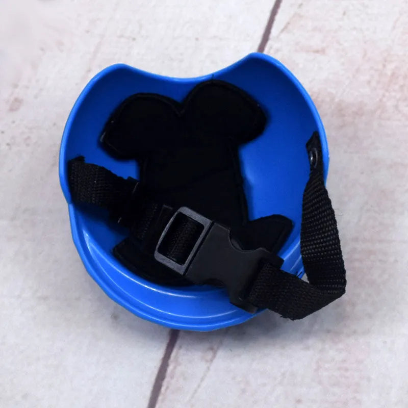 Plastic dog motorcycle helmet shown in multiple solid colours including pink, blue, and yellow, with size examples.