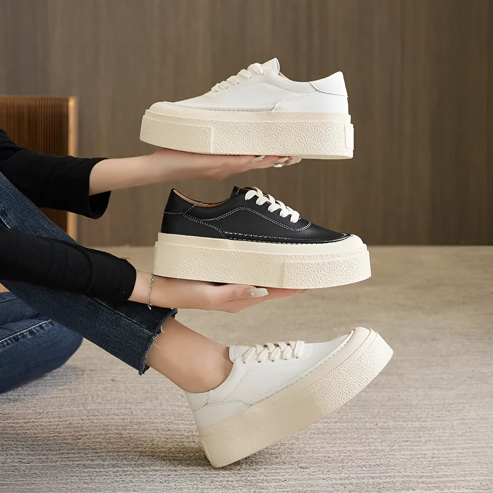 Women's black platform casual sports shoes with embossed cowhide leather upper and round toe design