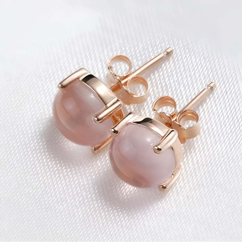Women's rose gold drop shape stud earrings with crystal inlay detailing in Korean style