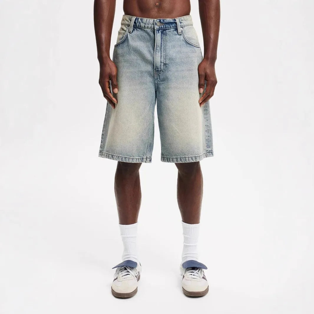 Men's loose fit straight leg jeans in light blue, black, and grey denim for summer street style