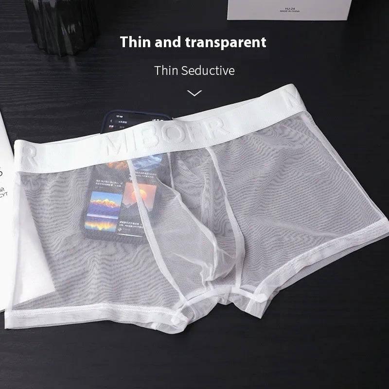 Men's solid colour thin boxer shorts in black, shown flat, highlighting breathable quick-dry fabric.