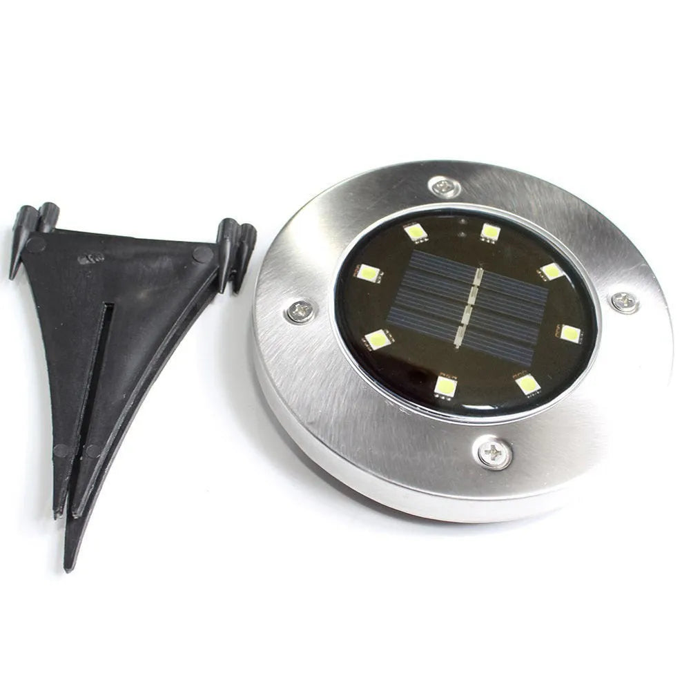 Four solar powered stainless steel lawn lights with LED, 12x12x13cm, warm white or white light option