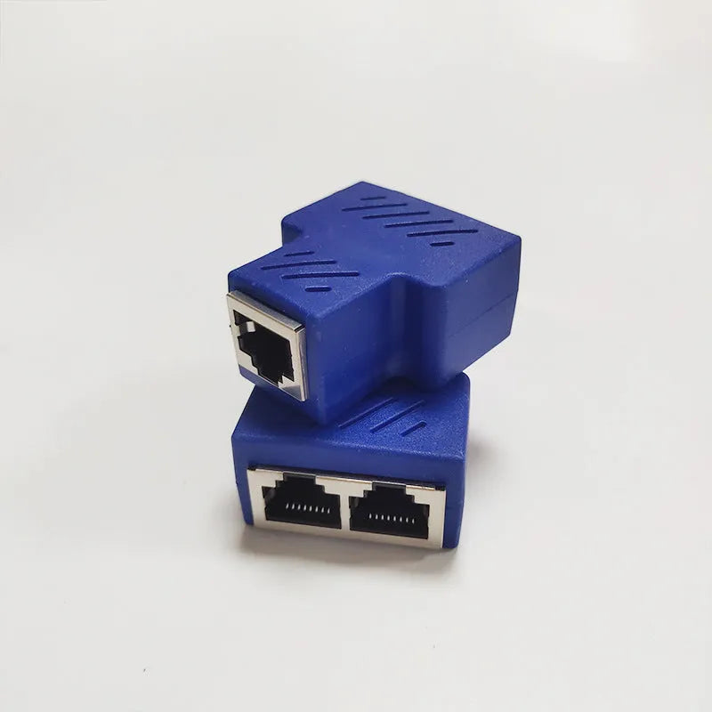 White RJ45 network cable splitter showing one male plug and two female Ethernet ports.