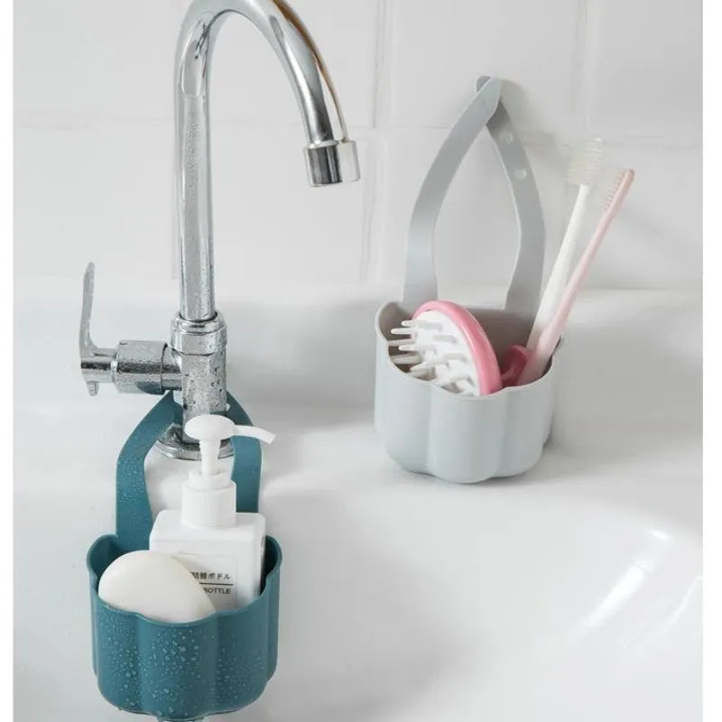 Nordic-style plastic sink drain basket in dark blue measuring 20cm long