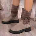 Women's chunky heel snow boots in suede with fleece lining and lace-up design
