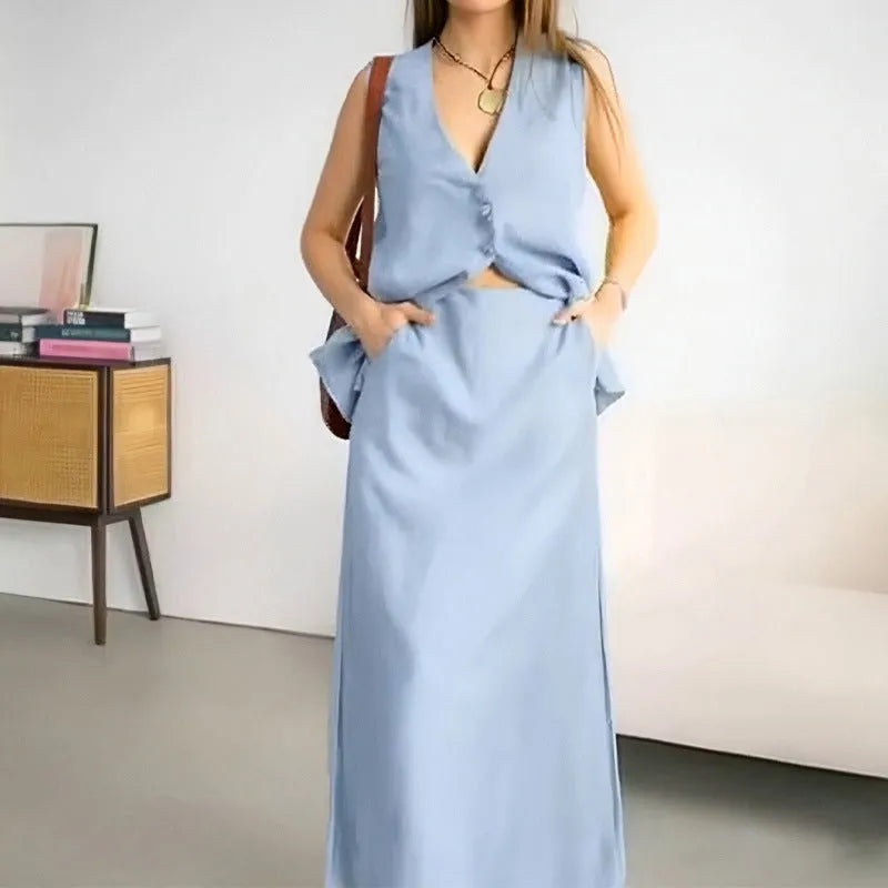 Women's casual two-piece suit set with sleeveless vest and long ankle-length skirt in polyester fabric