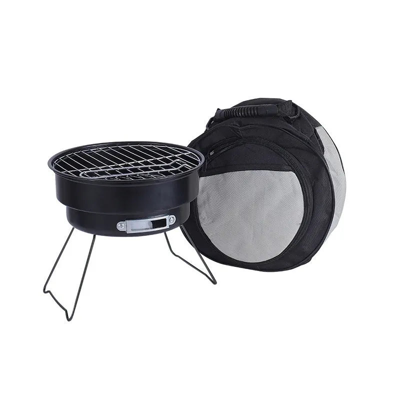 Small folding round ice stove with barbecue grill and accessories for outdoor cooking