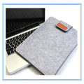 Khaki clamshell laptop bag with woven design, shown open to reveal polyester lining and corner protector.