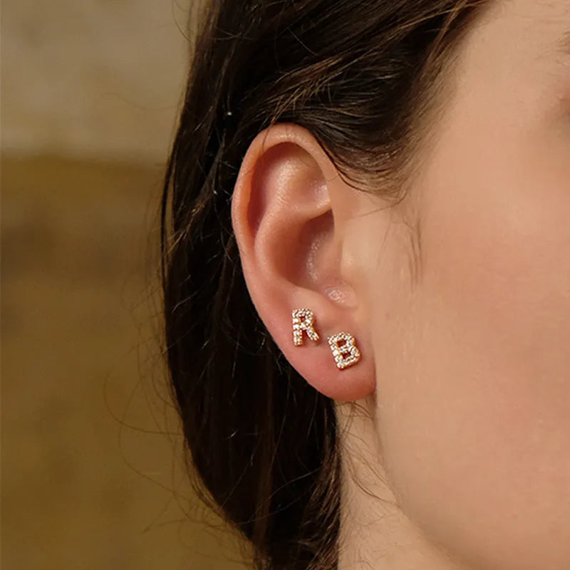 Brass gold plated alphabet letter earrings with zircon accents showing English letters A to Z options