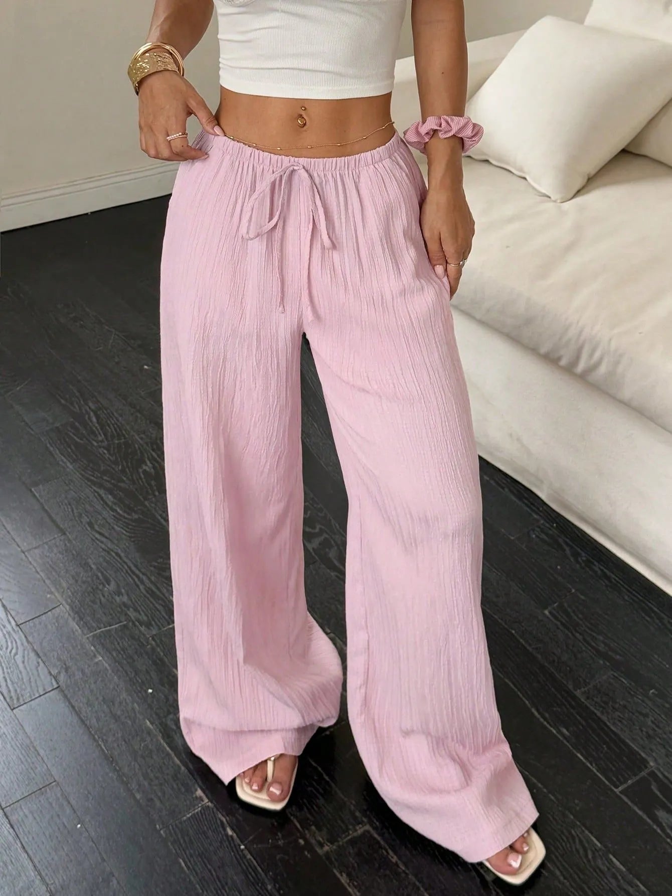 Women's wide leg trousers with lace-up waist trimming detail in polyester fabric
