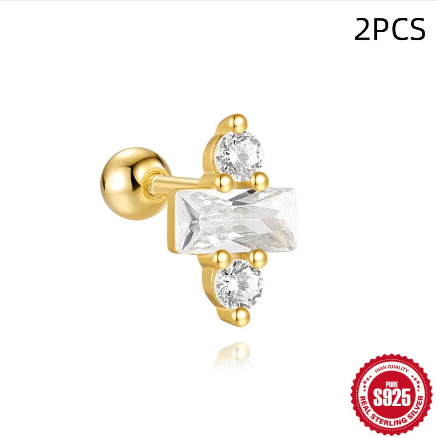 S925 sterling silver flower stud earrings with a square red gravel gemstone in a golden electroplated finish.
