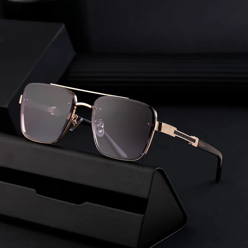 Men's vintage sunglasses with gold frame and gray lenses in European style design.