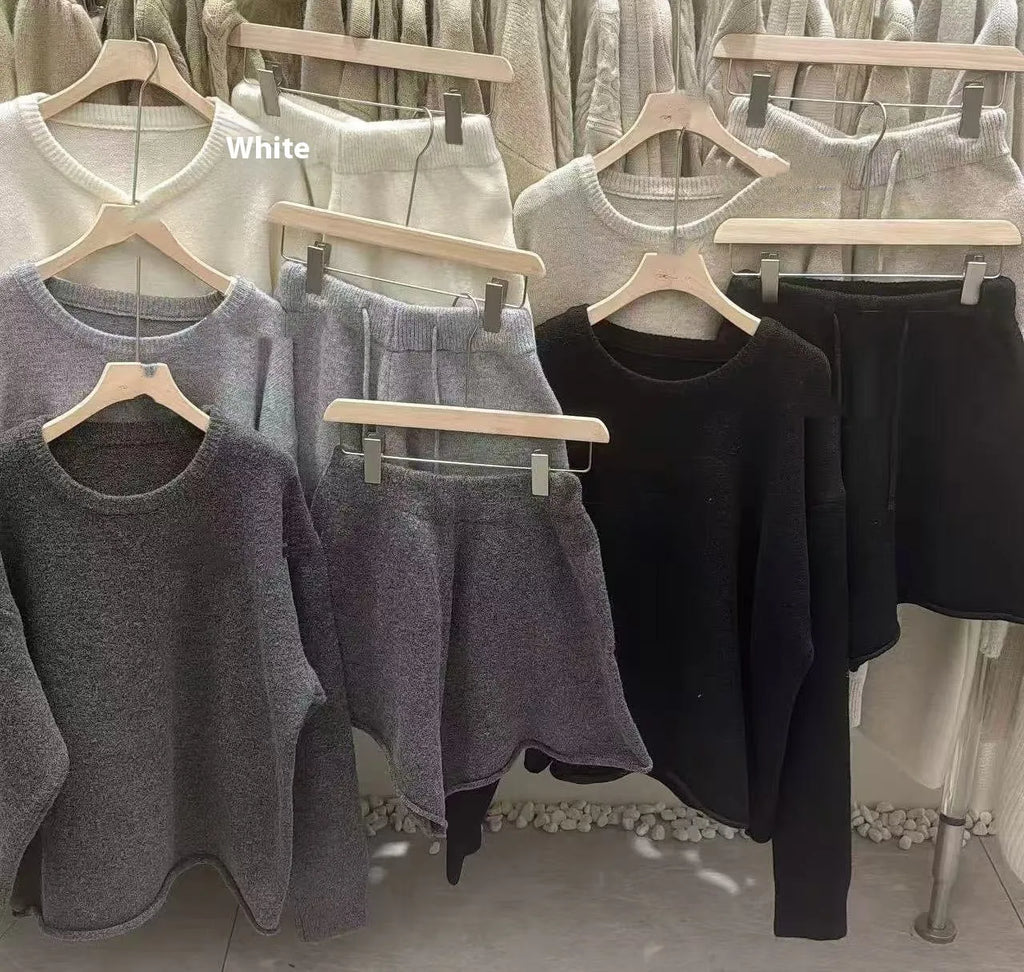 Women's loose-fitting long sleeve sweater and wide-leg shorts two-piece set in a neutral colour.