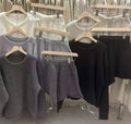 Women's loose-fitting long sleeve sweater and wide-leg shorts two-piece set in a neutral colour.