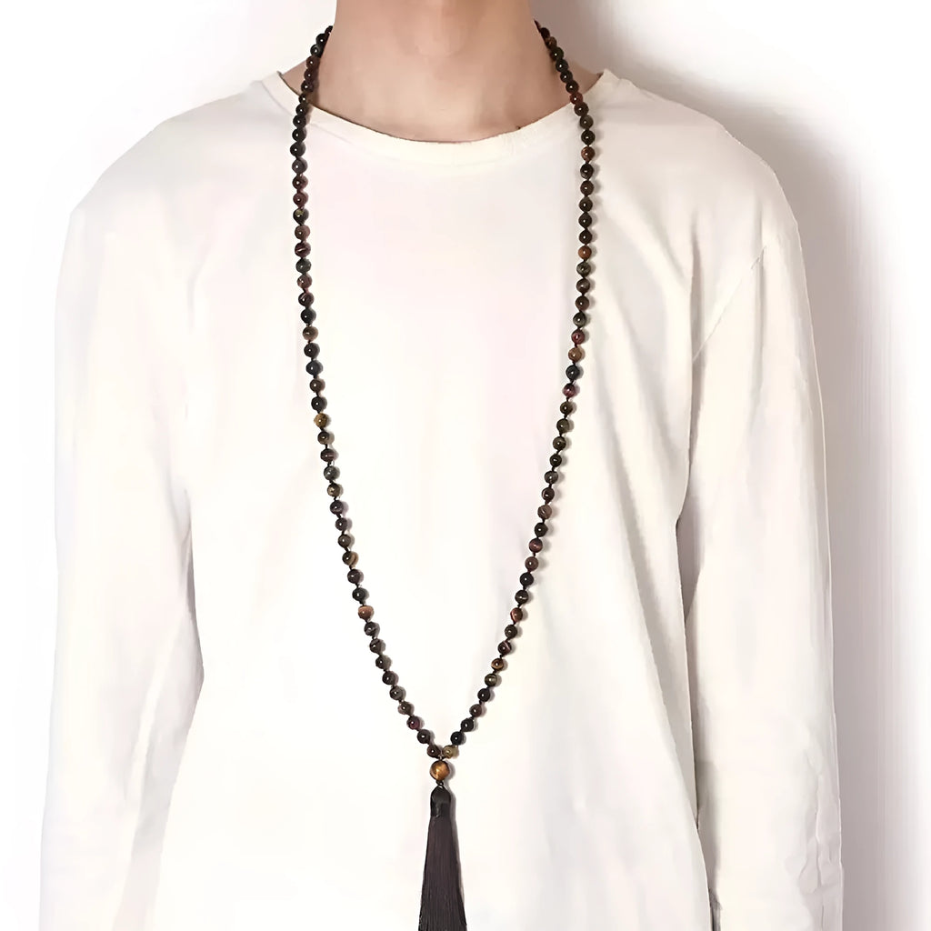 Long geometric agate tassel necklace showing colour options like Indian agate and lapis lazuli on a model.