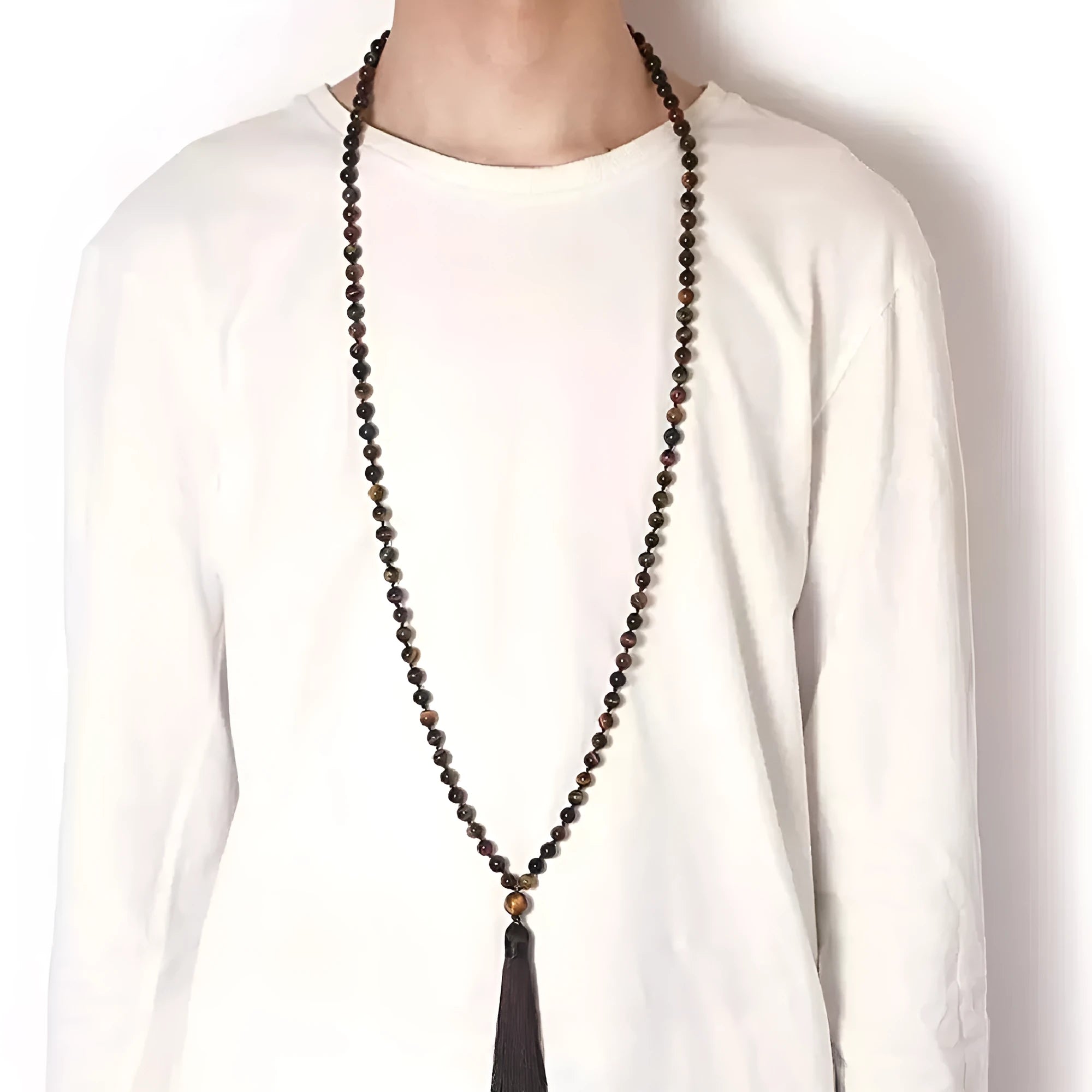 Long geometric agate tassel necklace showing colour options like Indian agate and lapis lazuli on a model.