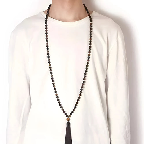Long geometric agate tassel necklace showing colour options like Indian agate and lapis lazuli on a model.