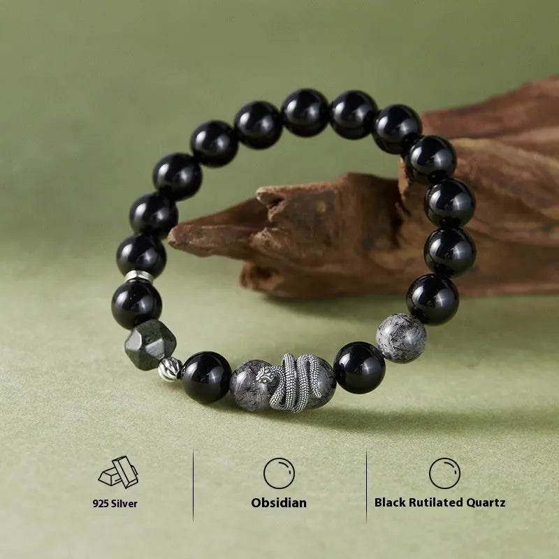 Black S925 sterling silver bracelet with snake modelling and obsidian stone details