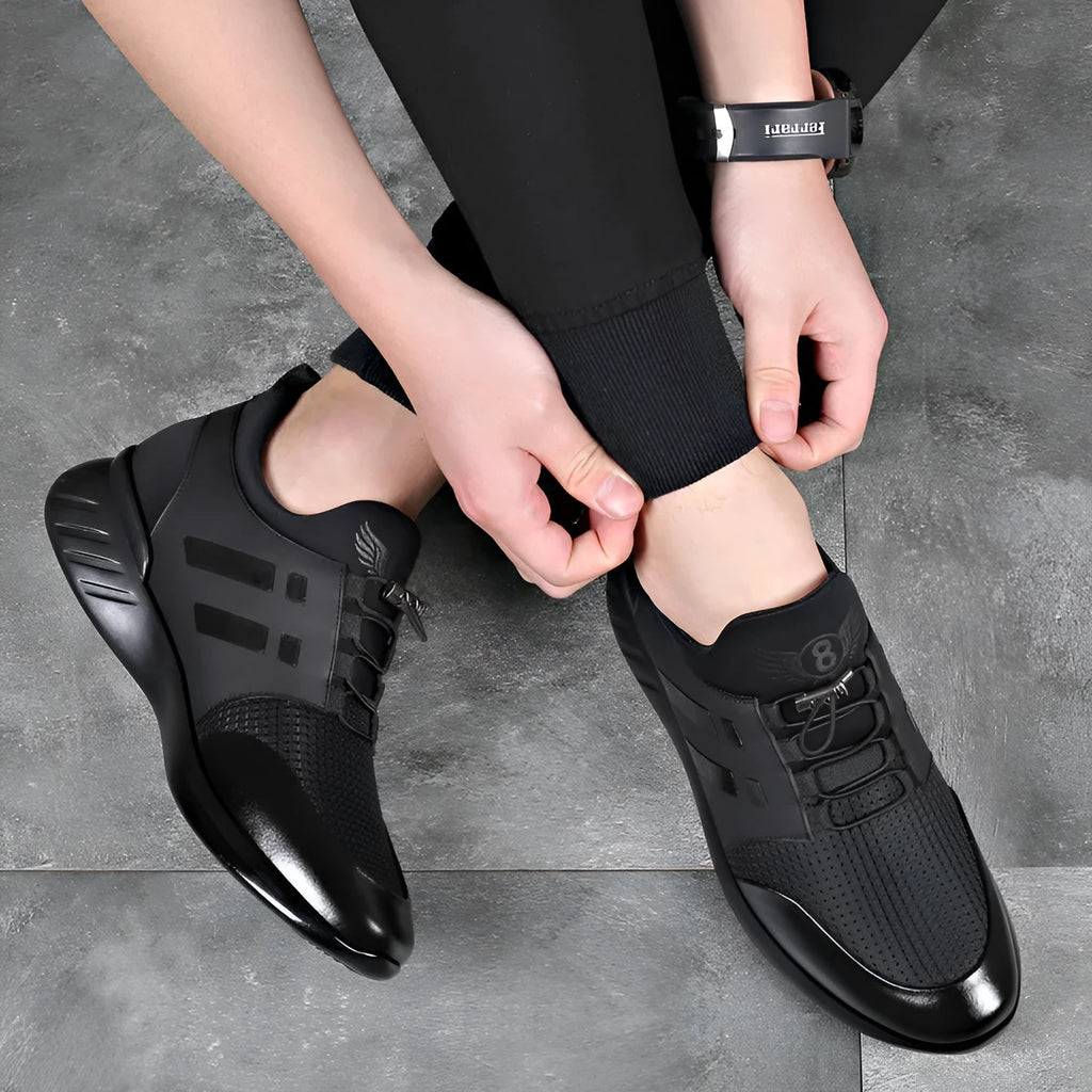Men's black casual height increasing shoes with chunky heel and round toe in leather, mesh, or Lycra.