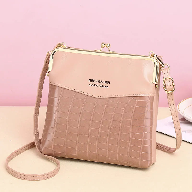 Mid-length PU leather messenger bag for women in retro embossed finish with multiple compartments, 18x4x17cm, wine red colour