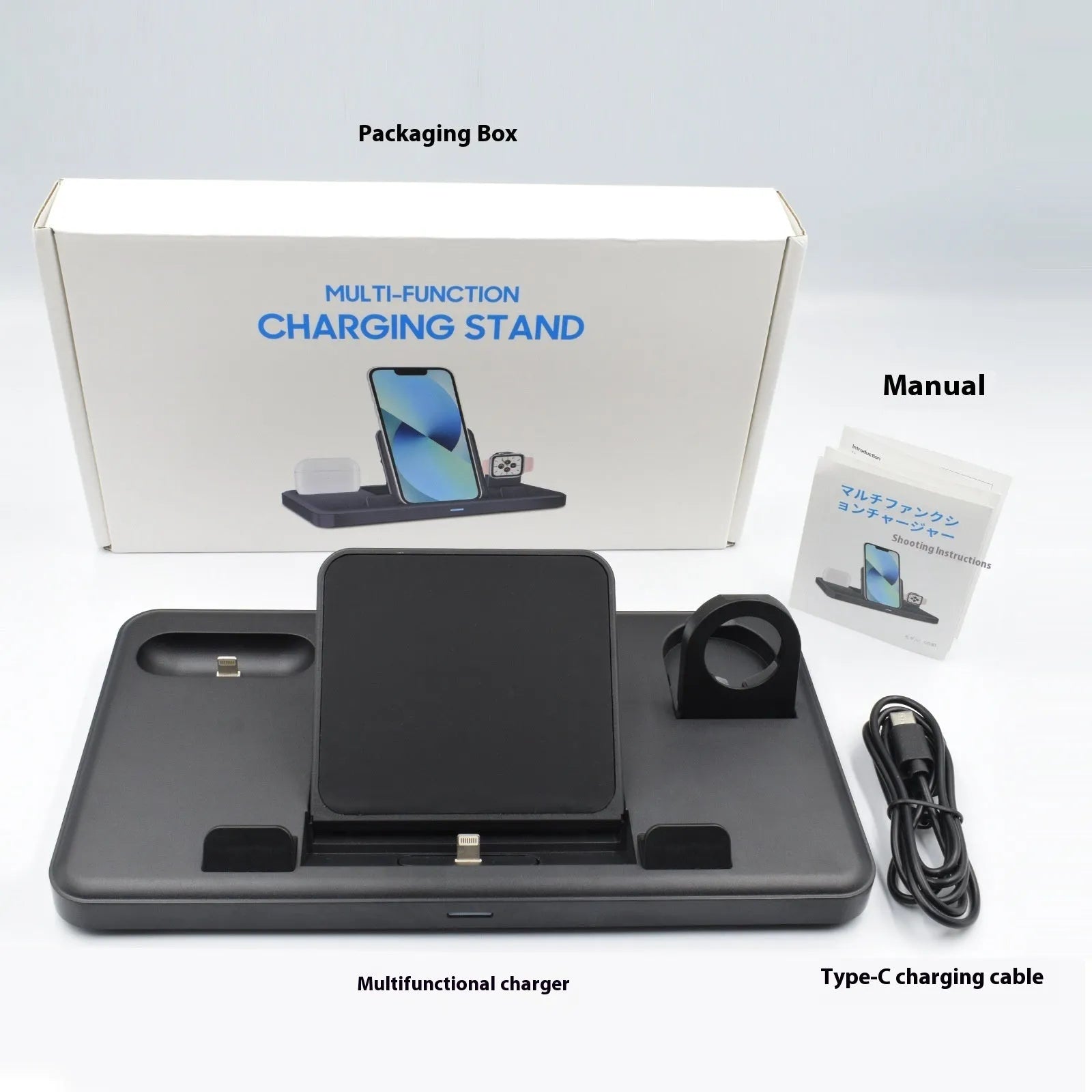 Black ABS plastic three-in-one charging base holding a mobile phone and tablet with cable attached