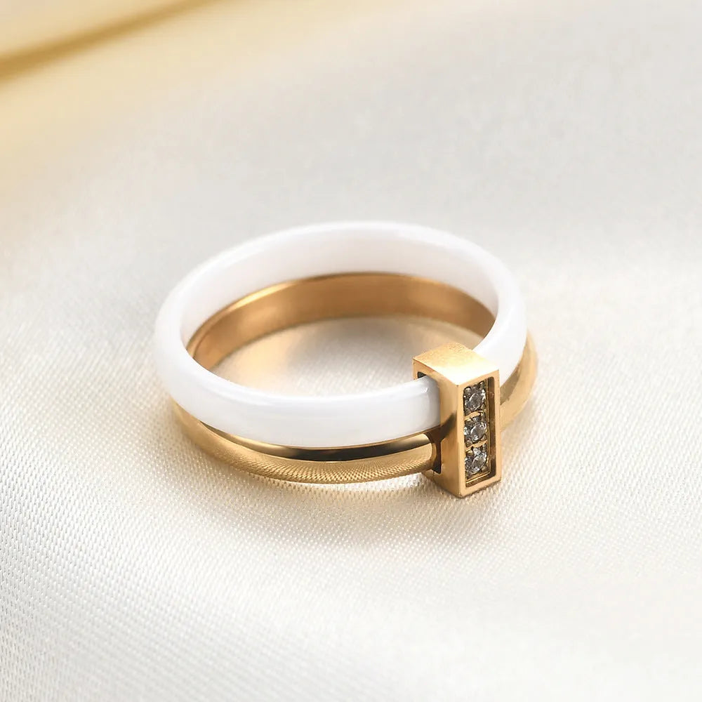 Women's ceramic ring with 6mm wide band and glossy zirconium inlay in steel black finish.