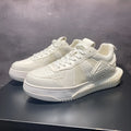 Men's summer leather breathable casual shoes in white with lace-up closure and rubber sole