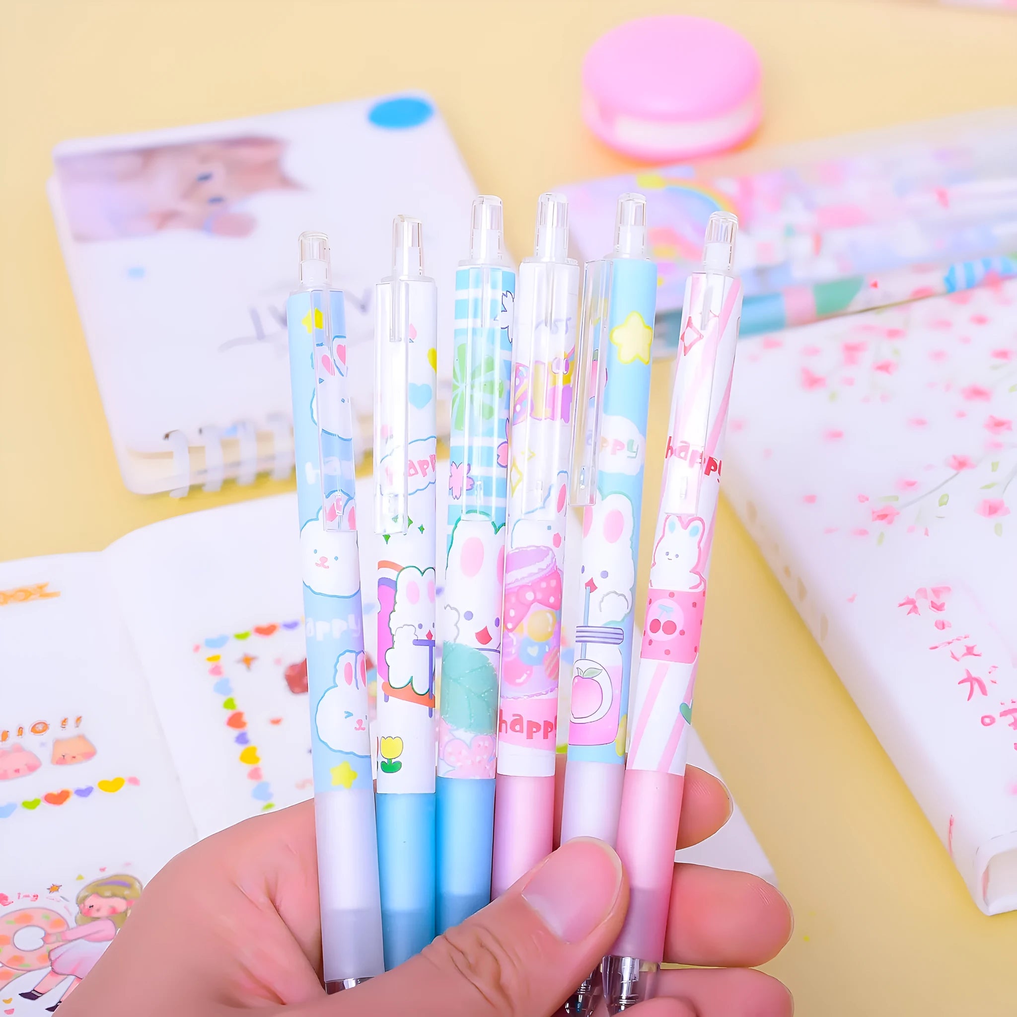 Six black plastic pens with 0.5mm tips and a cartoon bunny design.