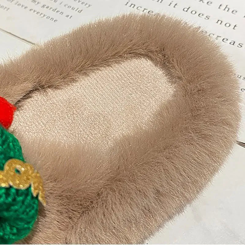Women's Christmas hat slippers with hairy faux plush upper in black, shown from the side.