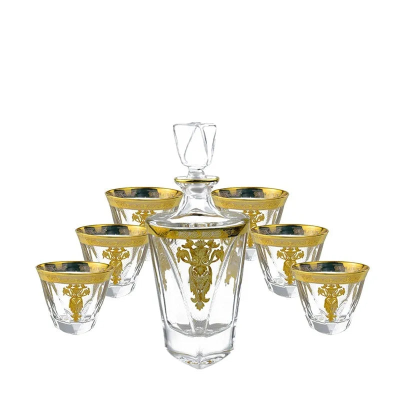 Gold line crystal glass whisky tumbler set with bottle and six glasses on white background