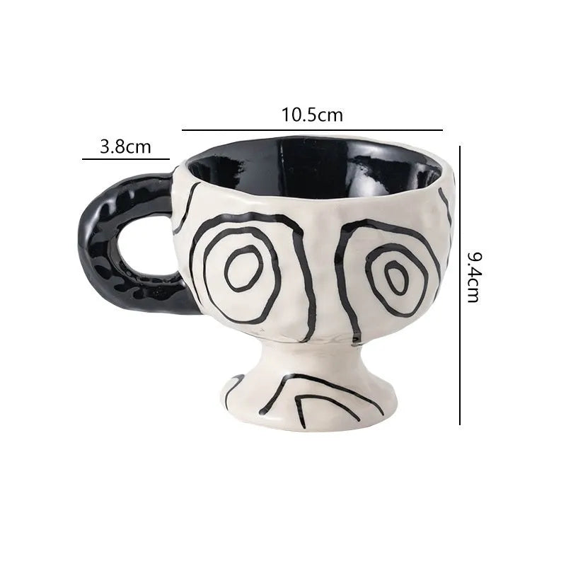 Hand-pinched irregular ceramic mug in a solid colour, shown from the side.