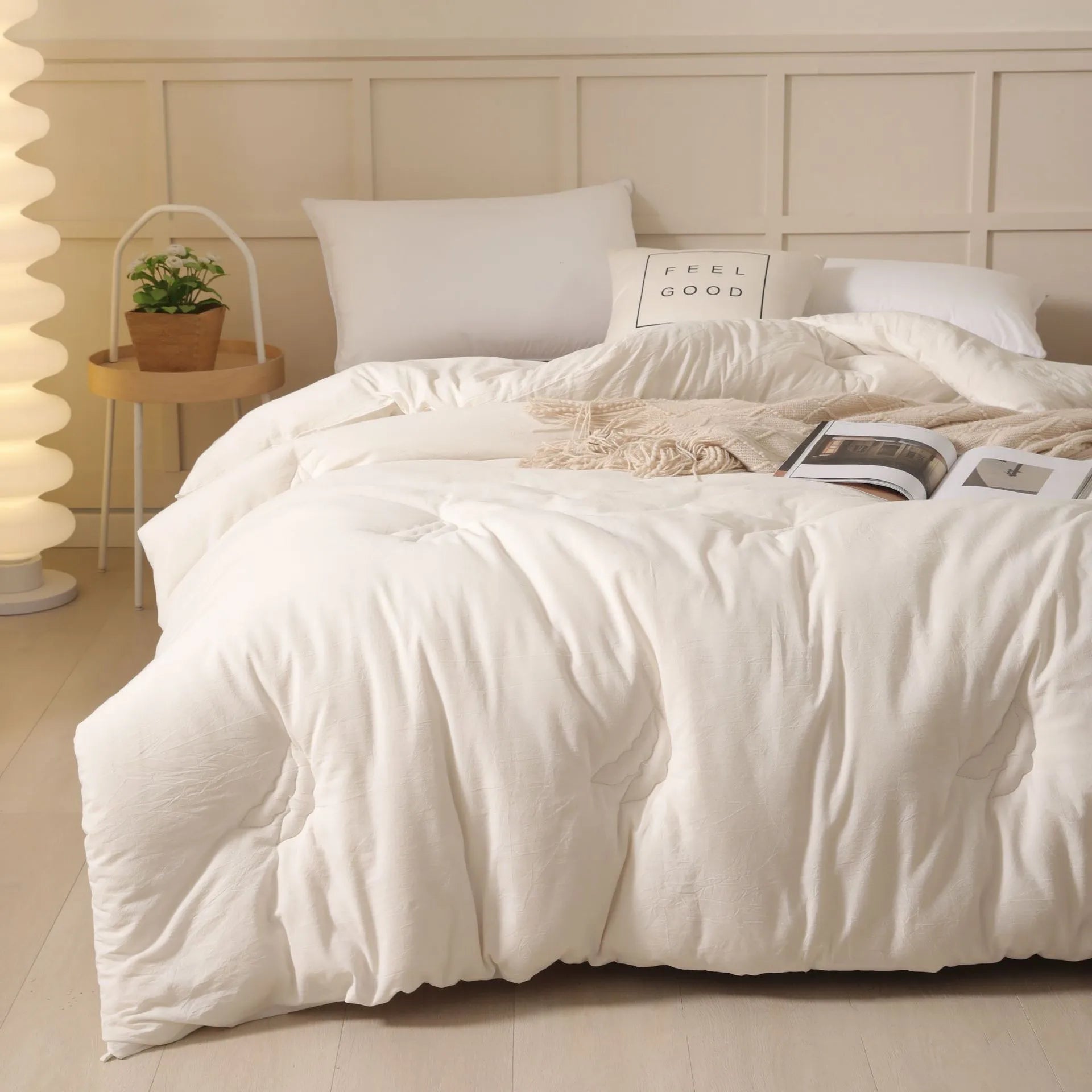 Soybean fibre quilt with pure cotton cover in white, pink jade, or grey, shown in various sizes.